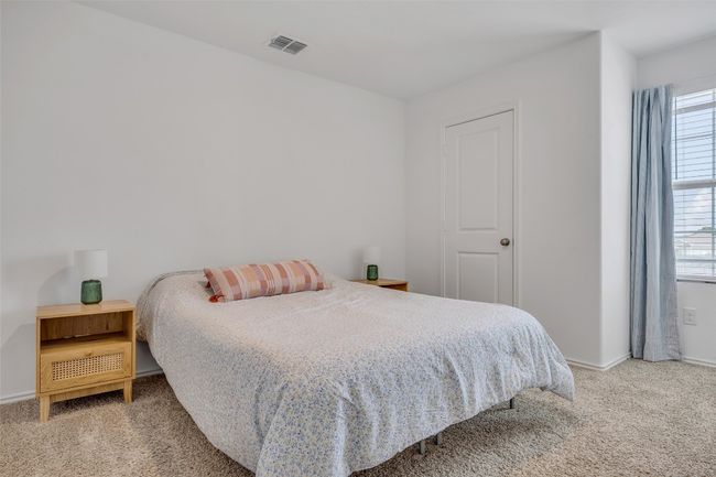 Bedroom featuring carpet | Image 23