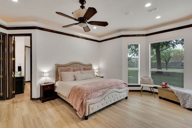 Bedroom featuring added sitting area, recessed lighting | Image 14