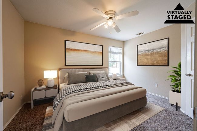 Carpeted bedroom with baseboards and ceiling fan | Image 23
