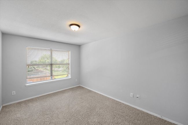 Unfurnished bedroom with new carpet | Image 32