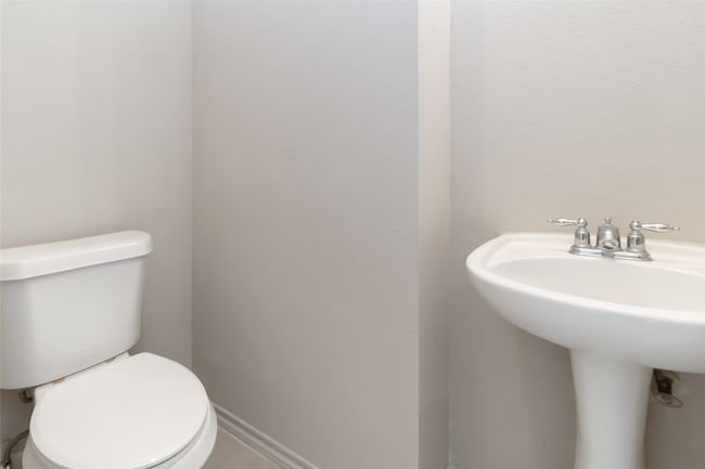 Half bath with toilet and a sink | Image 14