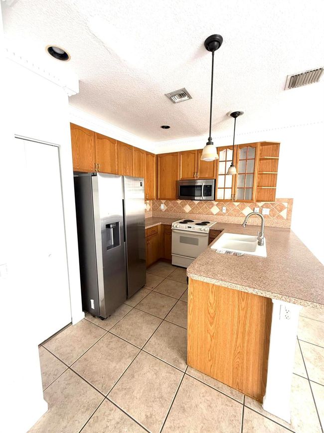 4232 Lake Tahoe Cir, House other with 3 bedrooms, 3 bathrooms and null parking in West Palm Beach FL | Image 4