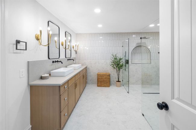 Bathroom with double vanity, walk in shower, and recessed lighting | Image 30