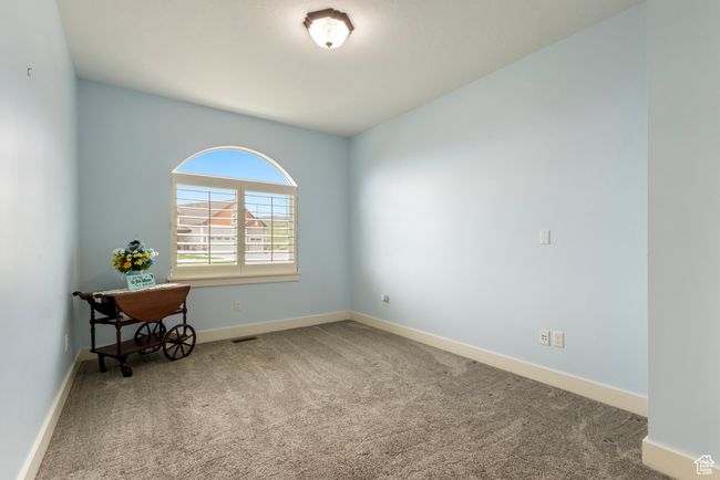 Empty room featuring carpet flooring and baseboards | Image 23