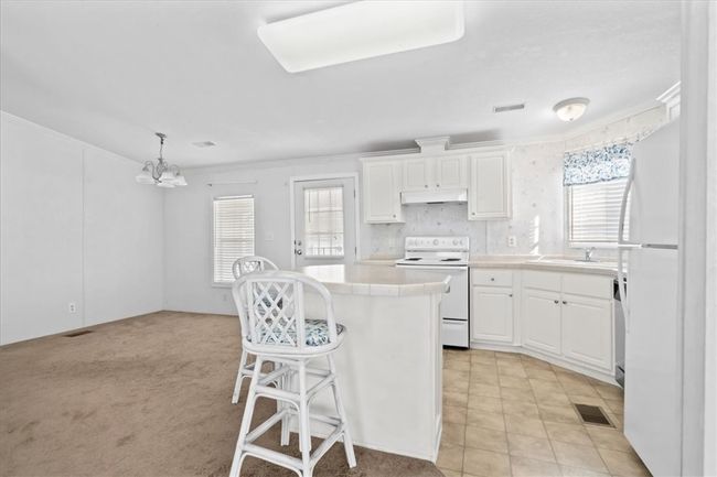 641 Hyacinth Cir, House other with 2 bedrooms, 2 bathrooms and null parking in Barefoot Bay FL | Image 8