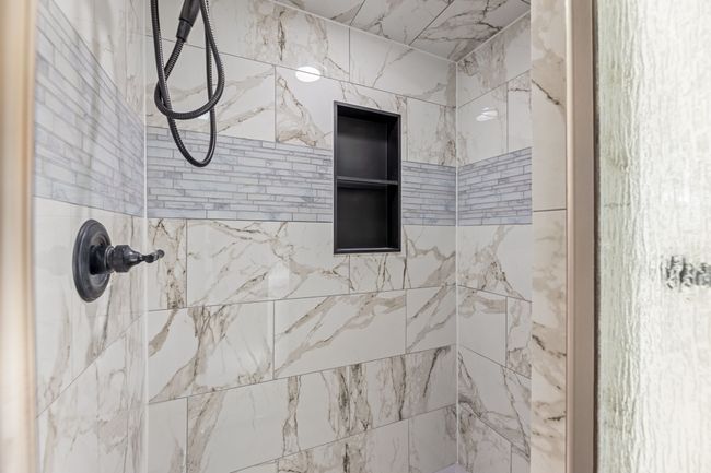 Details with tiled shower | Image 34