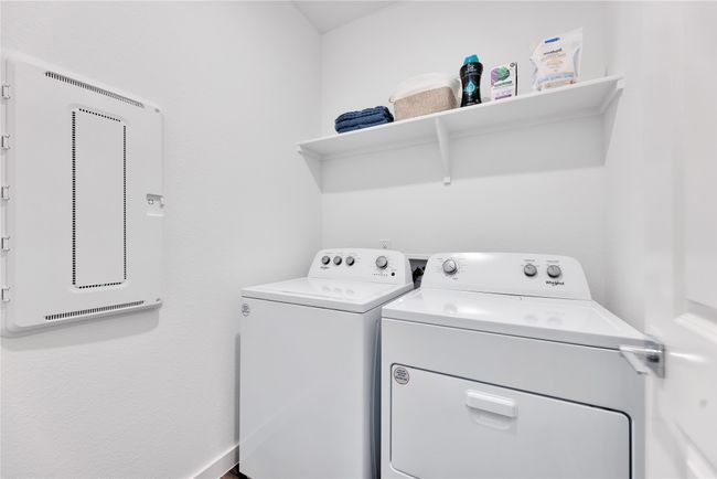 Laundry area featuring laundry area and separate washer and dryer | Image 32