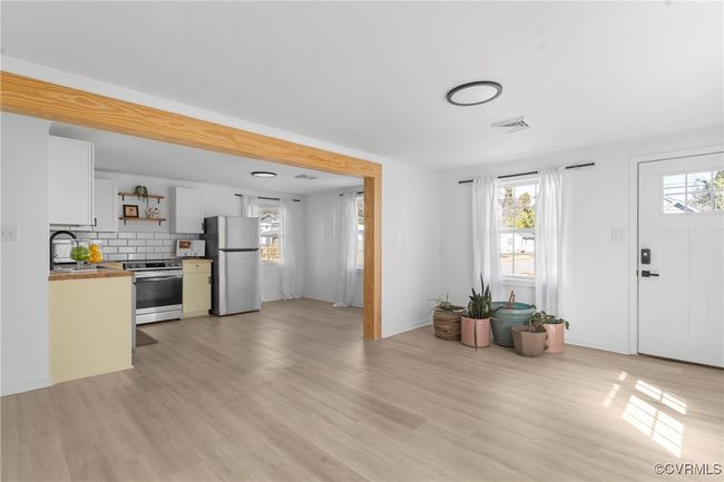 View of the Great Room looking back to the front door | Image 11
