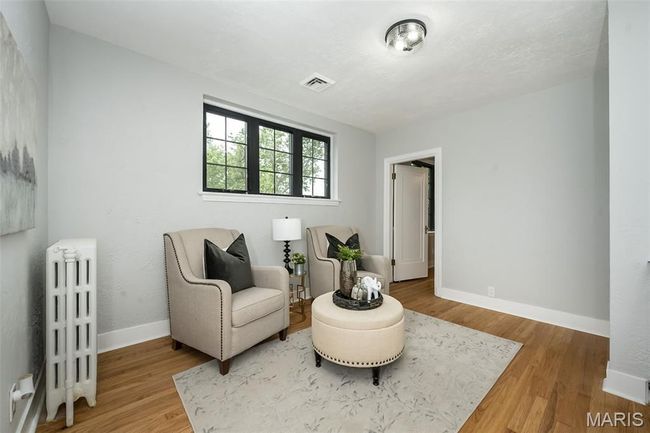 Sitting room at the top of the stairs is the perfect place to relax! | Image 21