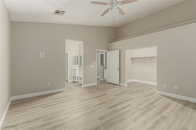 Master Bedroom and light wood finished floors | Image 19