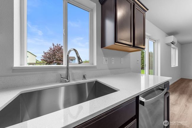 Photographs are for illustrative purposes only. Features, finishes, interior/exterior colors, landscaping and floorplan shown may vary from actual homes built. | Image 11