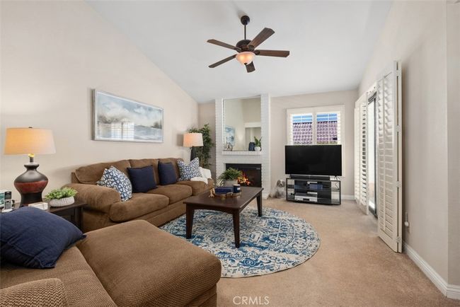 Here is a view of the large living room area | Image 11