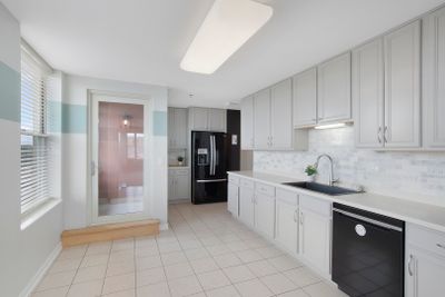 Tons of cabinet space in spacious kitchen | Image 2