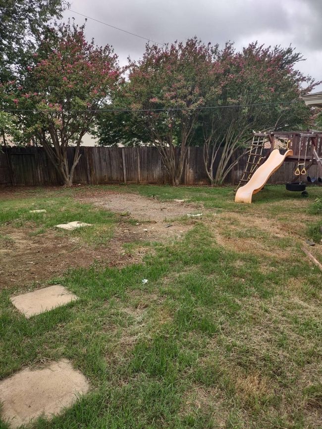 View of yard with a playground | Image 16