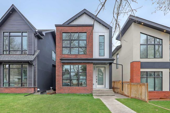 3420 Exshaw Road Nw, Home with 4 bedrooms, 3 bathrooms and 2 parking in Calgary AB | Image 1
