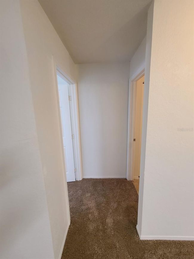 Hallway to Primary Bedroom | Image 12