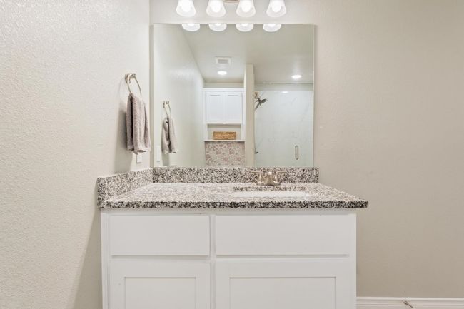 Full bath with a shower stall and vanity | Image 19