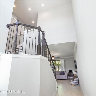 Entry hall looking up stairs | Image 3