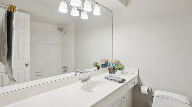 Full bathroom featuring shower / bathtub combination, vanity, and toilet | Image 17
