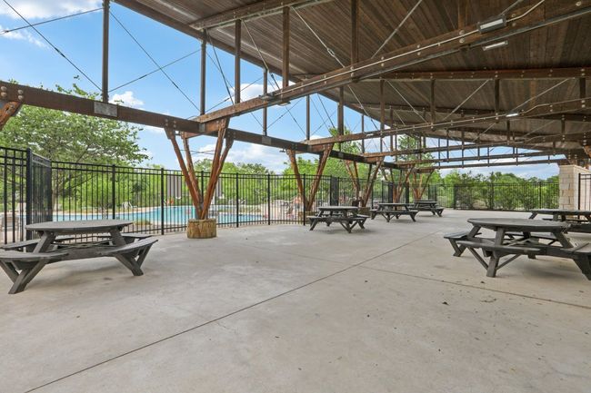 Surrounding community featuring a pool and fence | Image 34