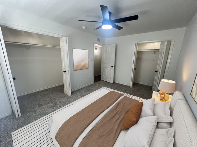 Bedroom featuring ceiling fan, baseboards, carpet, and a closet | Image 4