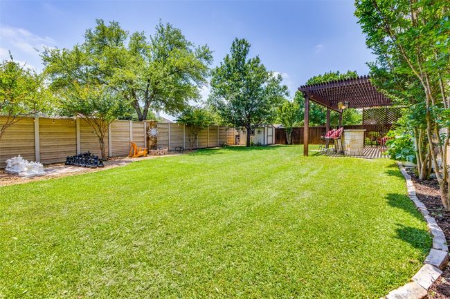 View of yard featuring a pergola | Image 25