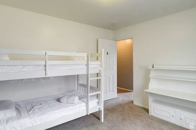 View of carpeted bedroom | Image 14