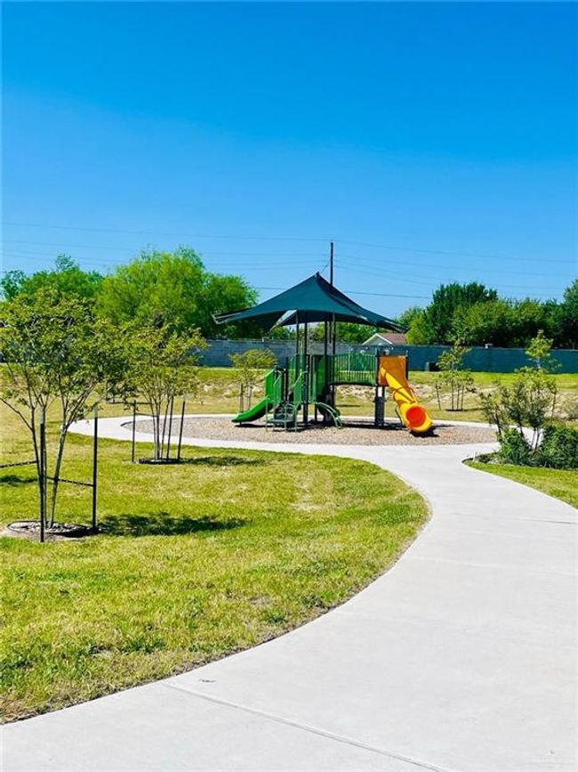 Community playground with a yard | Image 4
