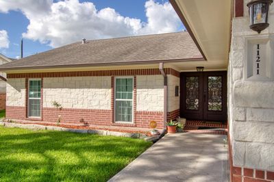 Double wide iron doors to Welcome Guests | Image 1