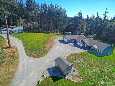 Detatched ADU to the left, Main Home + Shop on the right, pump house at forefront. | Image 2