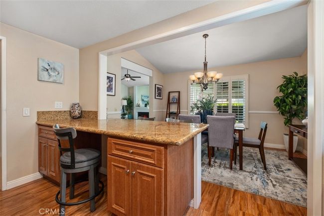Here is a closer look at the breakfast bar area that opens to the dining room | Image 19