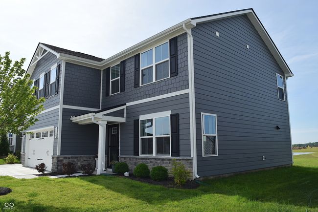 right angle view of home ~ pond behind home | Image 5