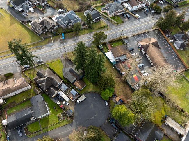 Aerial view of property's location featuring nearby suburban area | Image 12