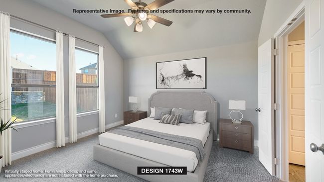 Carpeted bedroom featuring vaulted ceiling, multiple windows, baseboards, and ceiling fan | Image 6