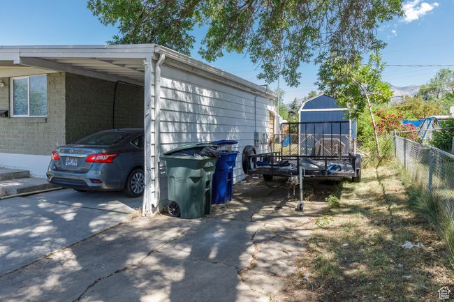View of property exterior with a carport and RV Pad | Image 33