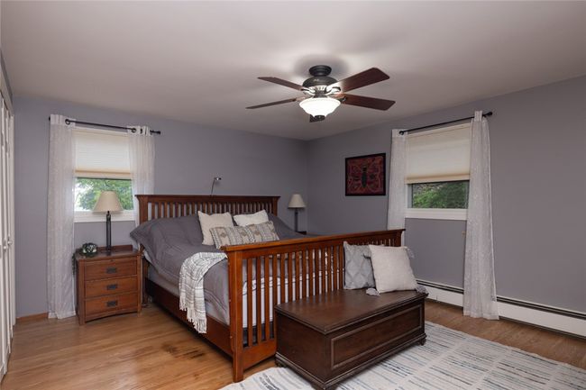 primary bedroom with hardwood floors and TWO closets! En Suite as well! | Image 17