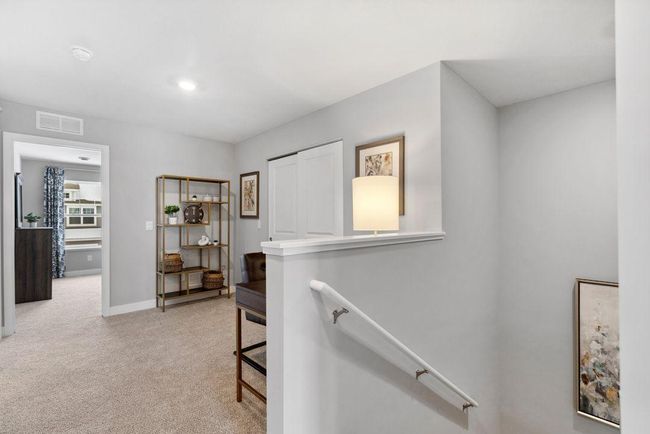 Upper-level loft lends itself to so many options - office, playroom, sitting area - you choose! Photo is of model home. Colors and options may vary. Ask Sales Agent for details. | Image 21