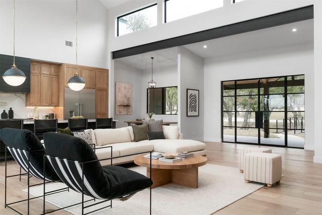 Oversized doors and windows frame breathtaking views of the backyard retreat | Image 9