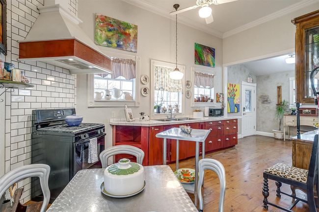 Downstairs, all rooms, including the Kitchen are 10 foot tall | Image 11