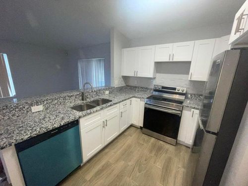 1105 W 9th St, Riviera Beach, FL, 33404-7350 | Card Image