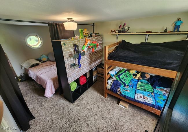 View of carpeted bedroom | Image 25