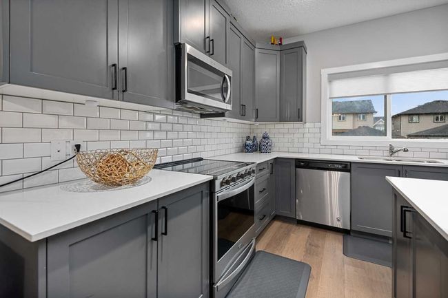 406 Hillcrest Road Sw, Home with 3 bedrooms, 3 bathrooms and 3 parking in Airdrie AB | Image 9