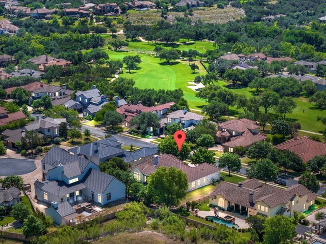Aerial perspective of suburban area featuring a local golf course | Image 35