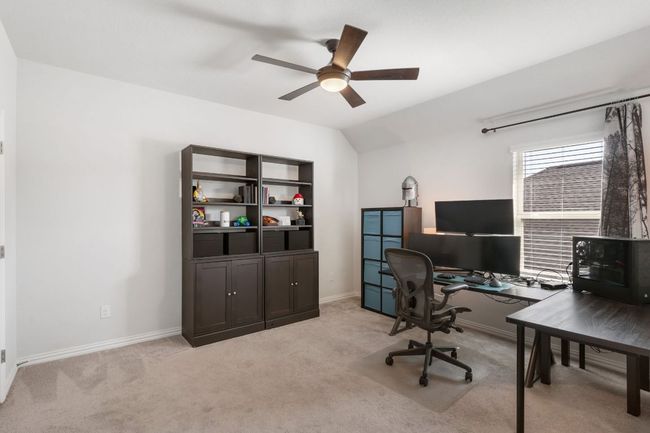 Nice size bedroom on the second floor being used as an office. | Image 22