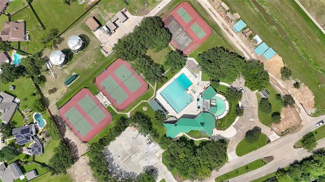 Tennis, pool, and club house private to the owners in the Steeplechase community. | Image 32