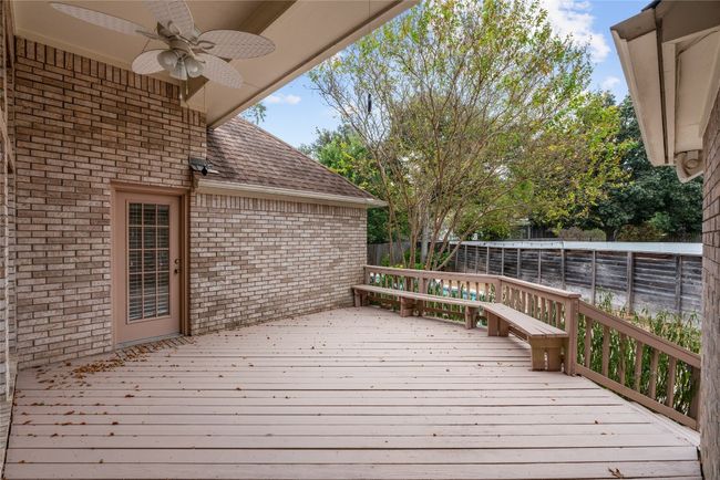 Partially covered Deck with bench | Image 38