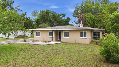 126 E Magnolia Ave, HOWEY IN THE HILLS, FL, 34737-3331 | Card Image