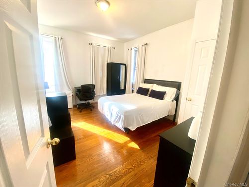 92 37th Ave, Jackson Heights, NY, 11372-7913 | Card Image
