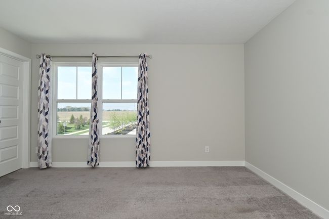 carpeted spare room with baseboards | Image 28