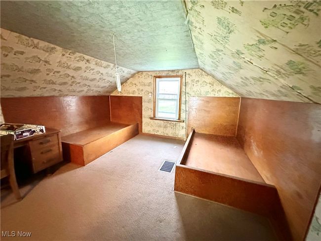Bonus room with vaulted ceiling, visible vents, and carpet flooring | Image 20